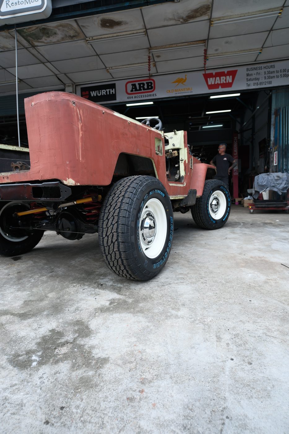 40 Series body in primer on the rebuilt chassis