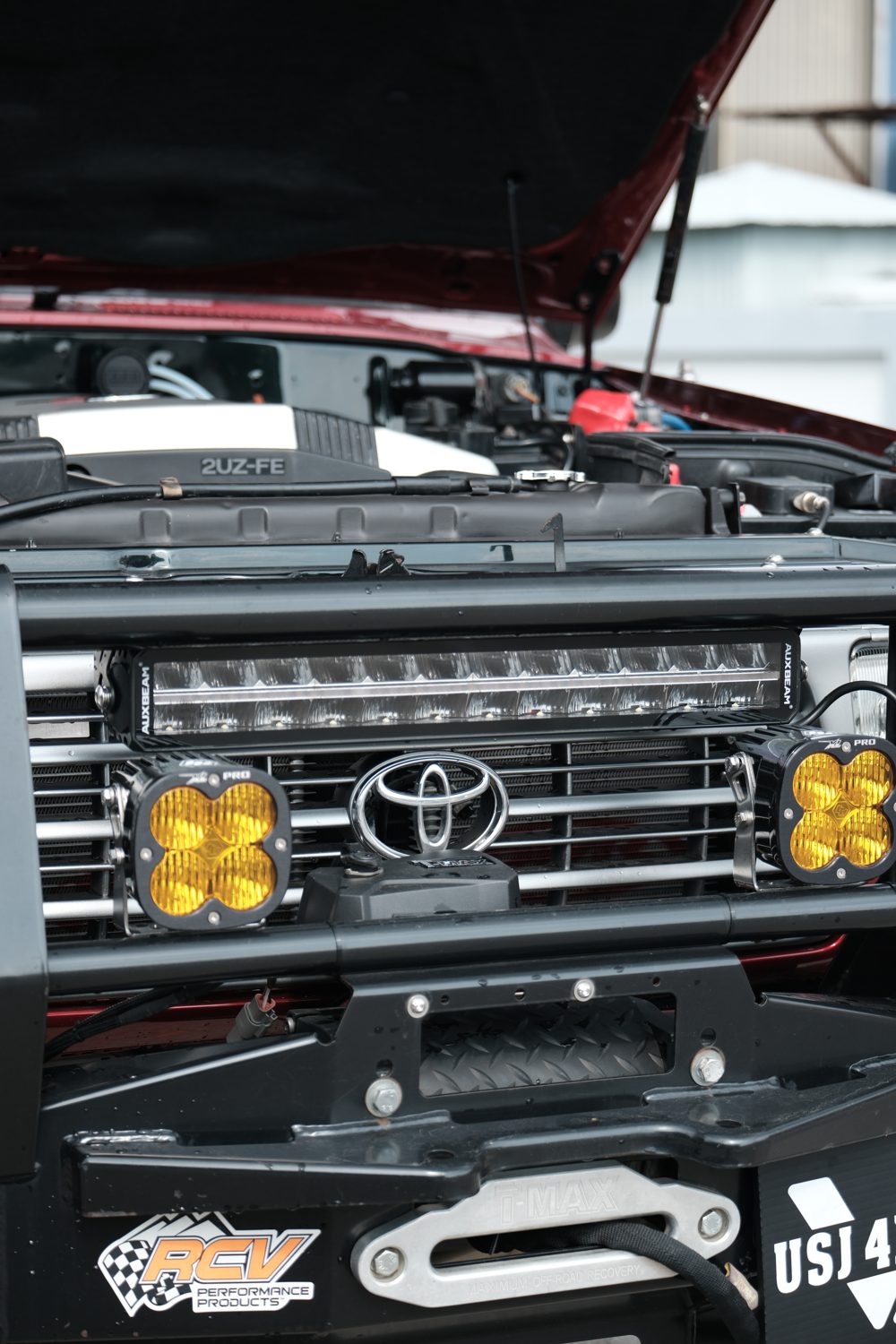 Front grille, driving lights and Toyota badge on the 80 Series
