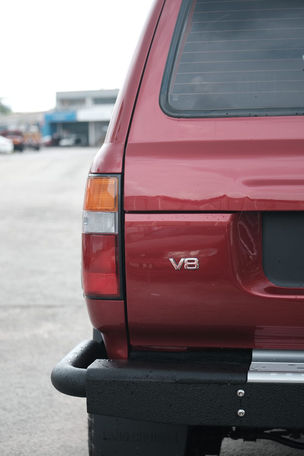 Rear V8 badge and tubular bumper on the 80 Series