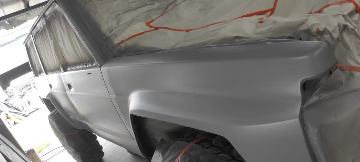 Body panel in primer during the Patrol respray
